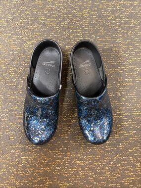 Dansko Women's Blue Speckled Patent Clogs